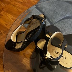 Beautiful black wedges by GUESS. Size 6.5